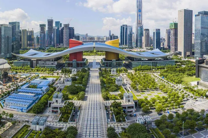Aerial view of a modern Chinese civic complex framed by high-rise towers